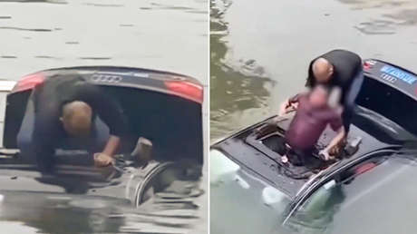 Héroe chino salva a una persona de hundirse en su auto (VIDEO)
