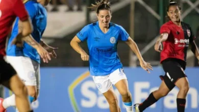 Jugadoras de Belgrano celebran el título y la clasificación a la Libertadores