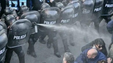 Manifestantes contra la reforma laboral