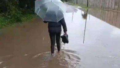 Calle principal de Quintas del Rosario anegada después de las lluvias