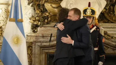 Adrián Ravier y Diego Santilli en una reunión oficial